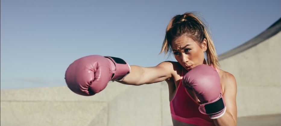 young woman boxing for fitness