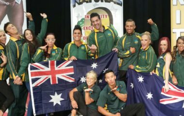 elite athlete group at awards ceremony group photo