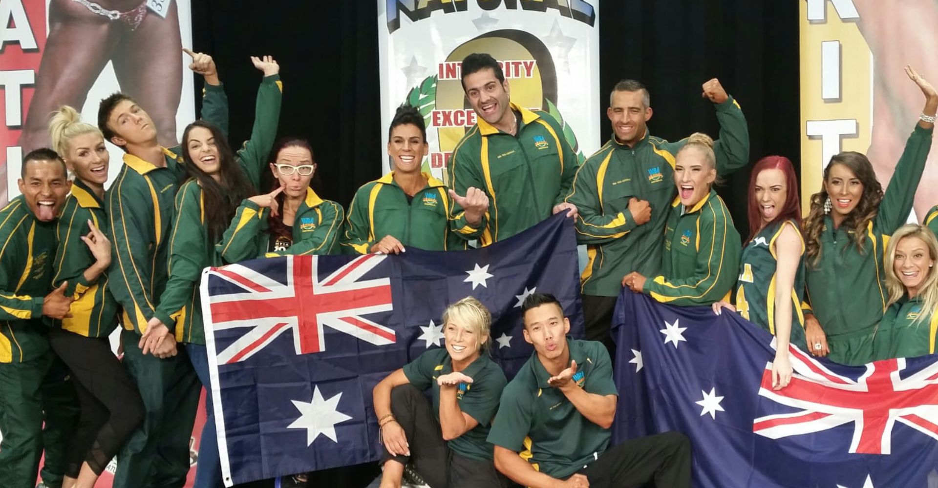 elite athlete group at awards ceremony group photo